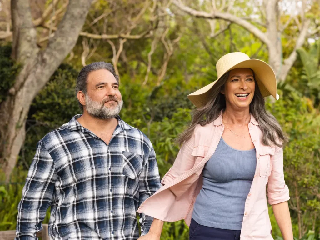 A couple walking together outdoors